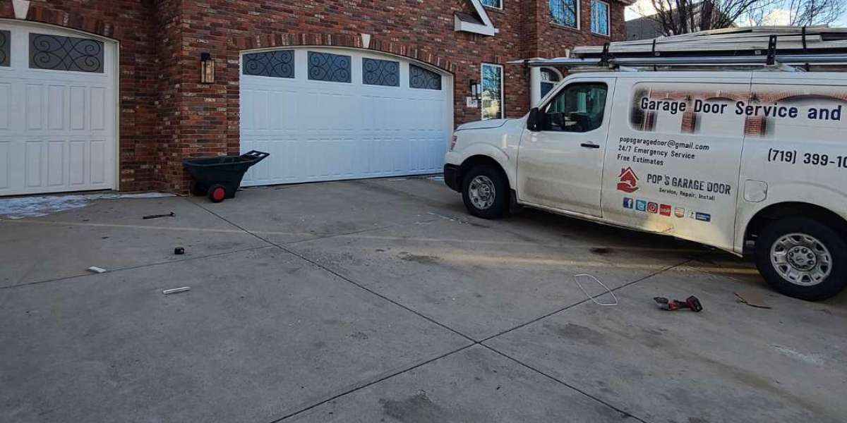 How often should I perform a garage door safety check?